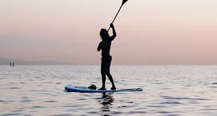 Paddle Surf al amanecer o atardecer en Barcelona